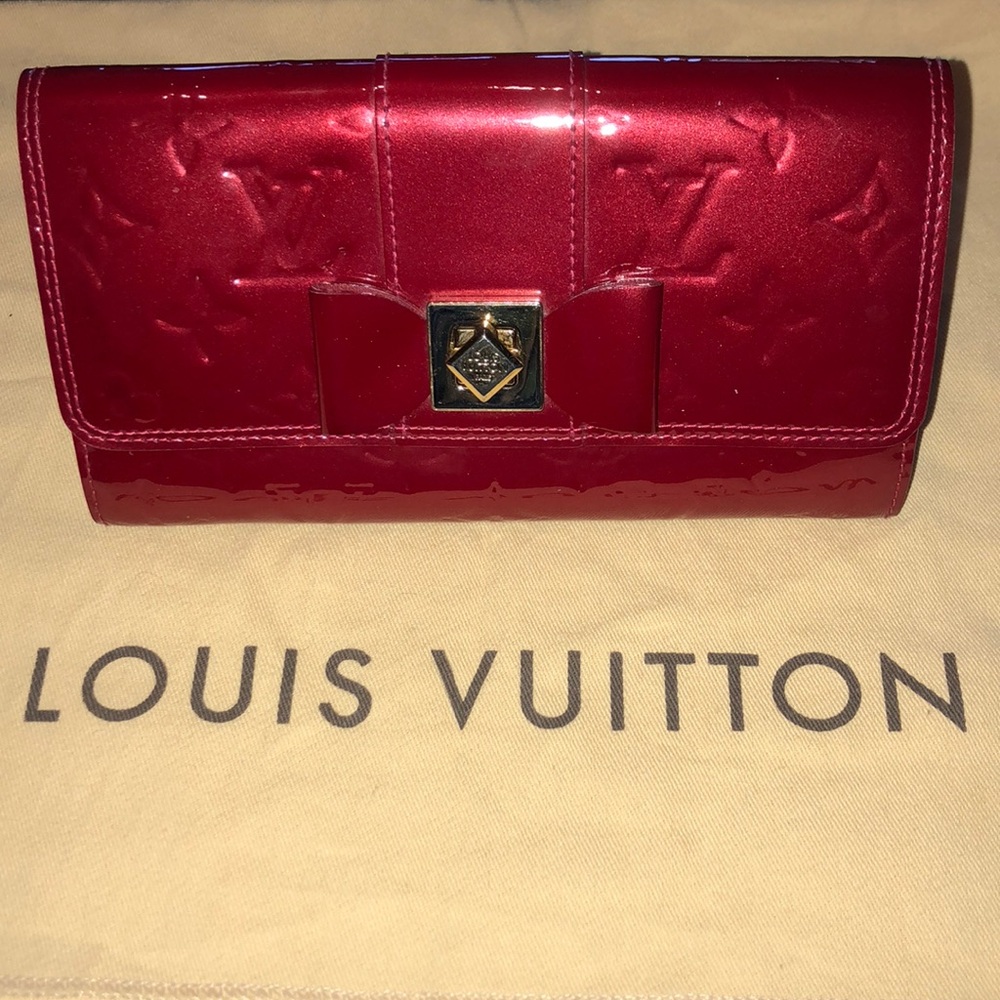 Red patent leather Louis Vuitton wallet